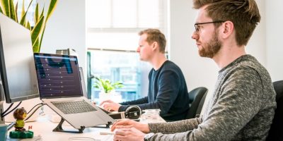 Online Distractions Man Working On Computer